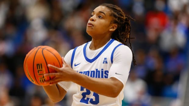 Memphis basketball player Jamirah Shutes shoots a free throw in a game.